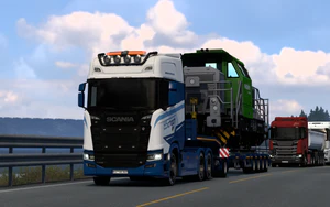 牵引着G6行驶在北欧湖边小路的斯堪尼亚 (3).png